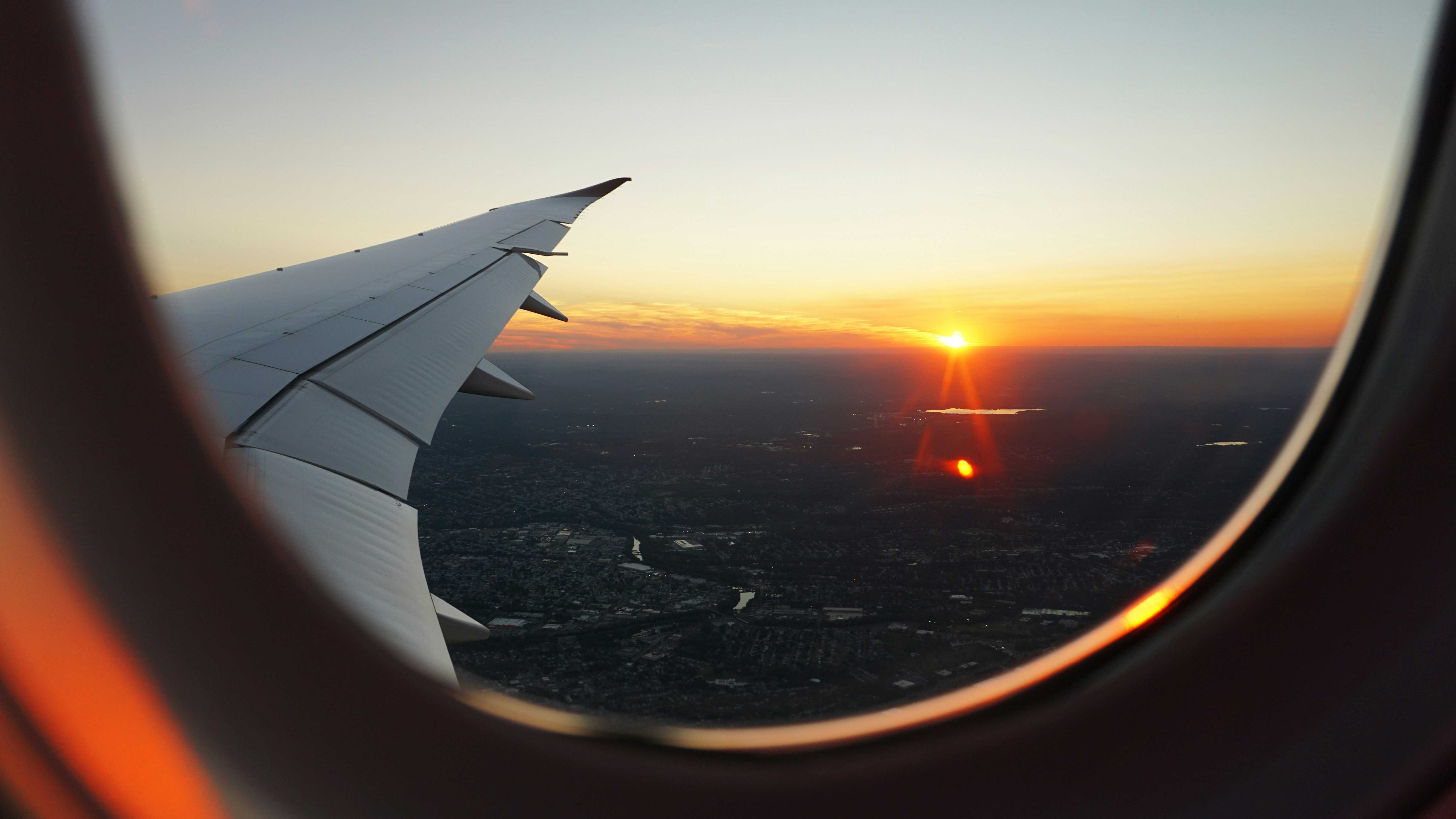 Travel seen through an airplane window