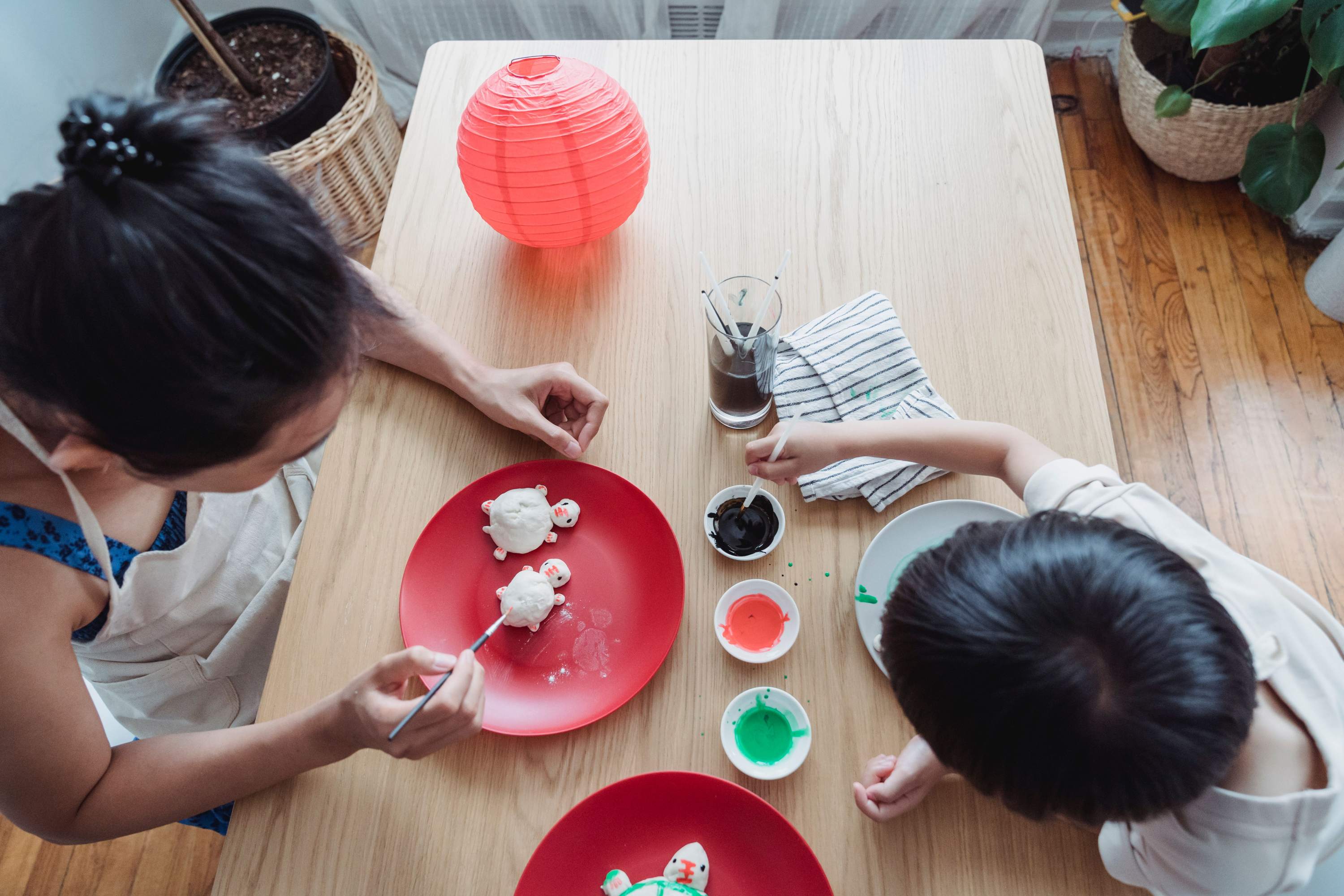 Parent and child creating art together